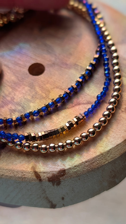 Gold, Blue Sapphire Crystal & Hematite Triple Strand Bracelet