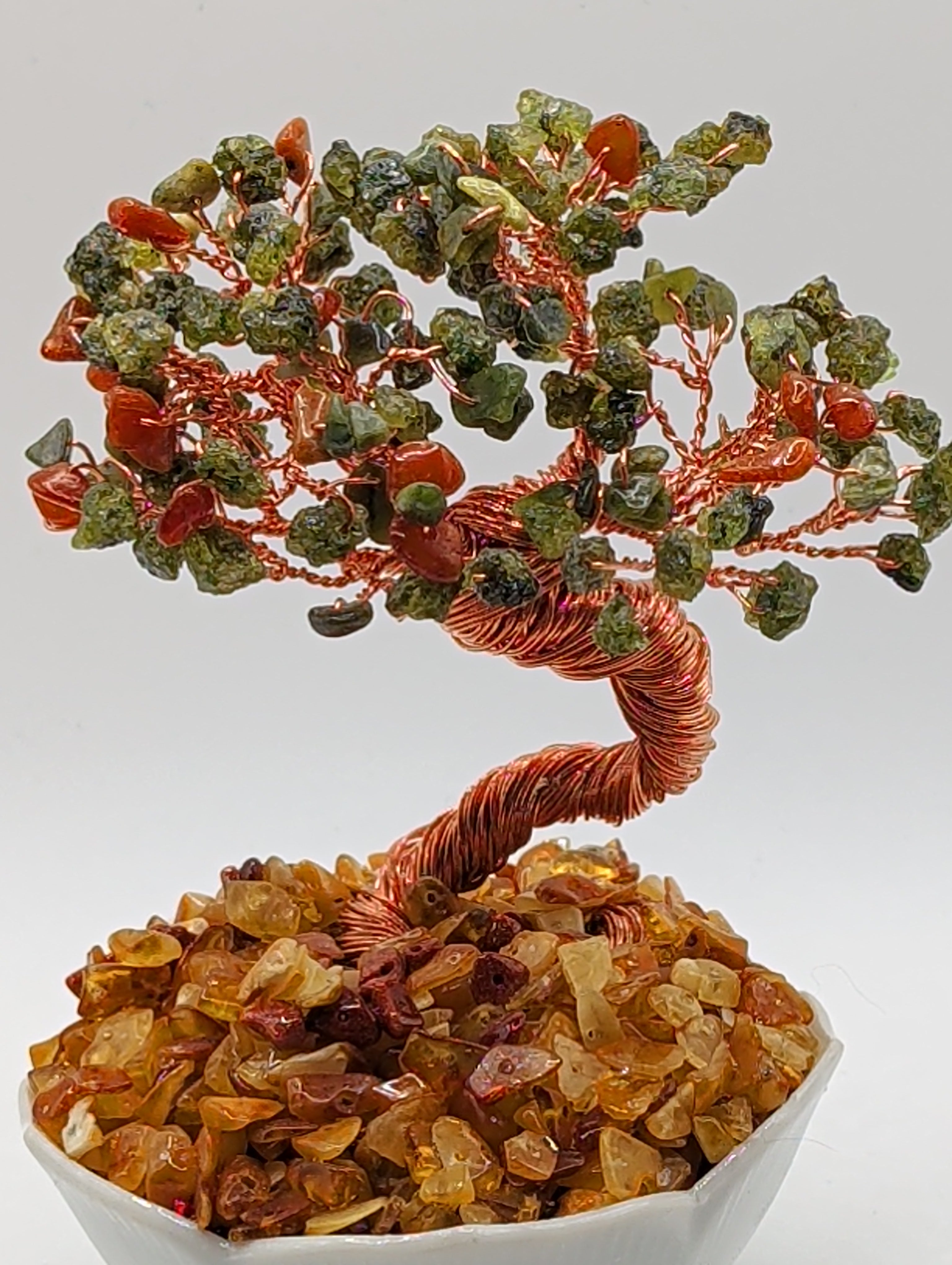 Pure honey amber base with peridot foliage