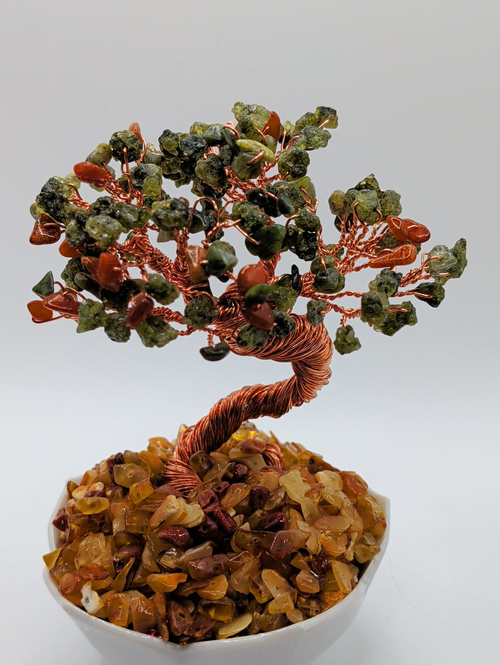 Pure honey amber base with peridot foliage