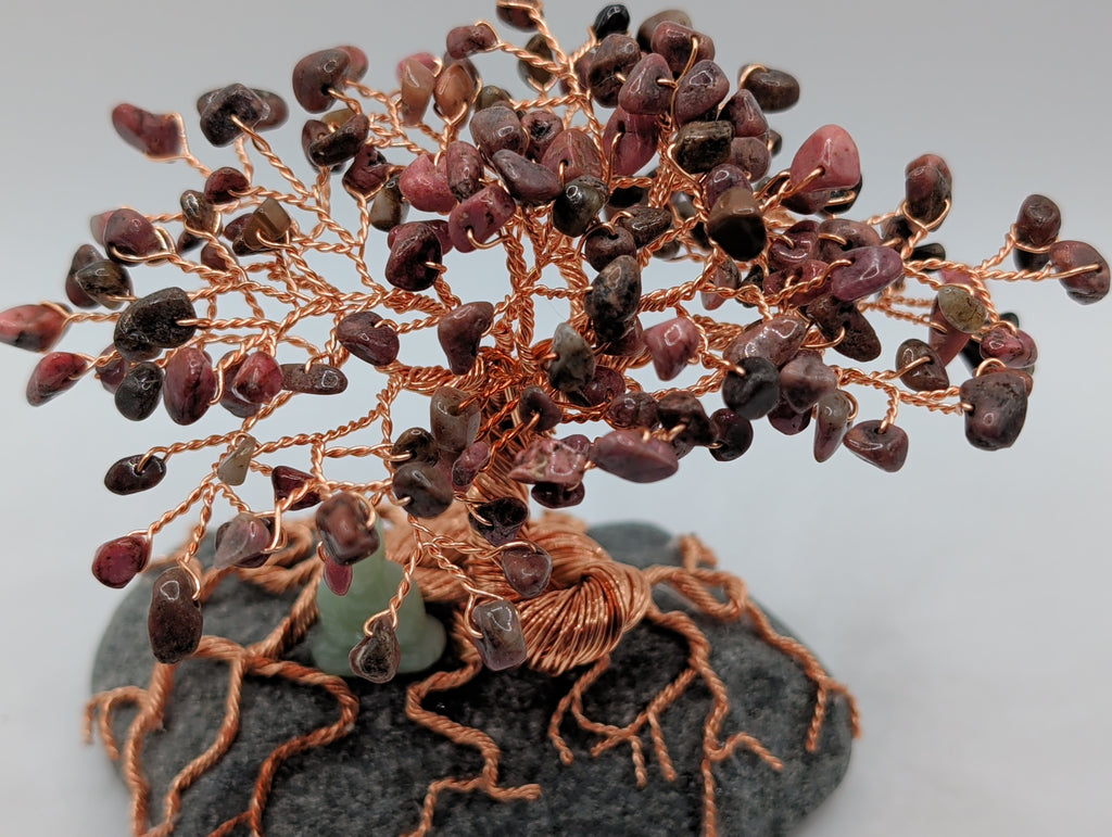 Bodhi tree of life with meditating Buddha