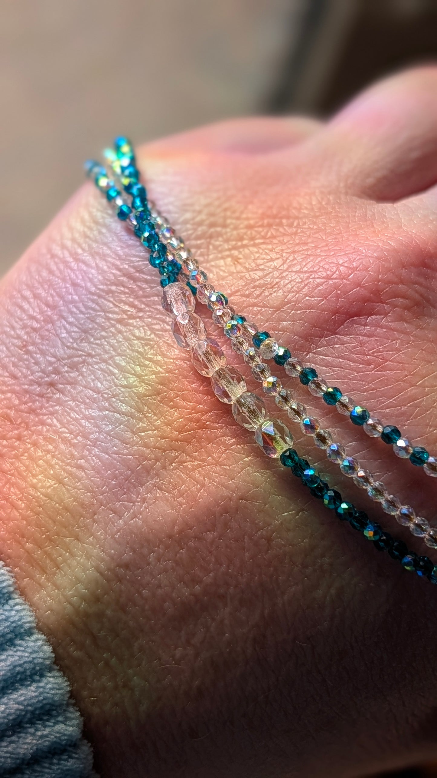 Aqua AB and clear AB crystal multi strand bracelet with gold filled closure