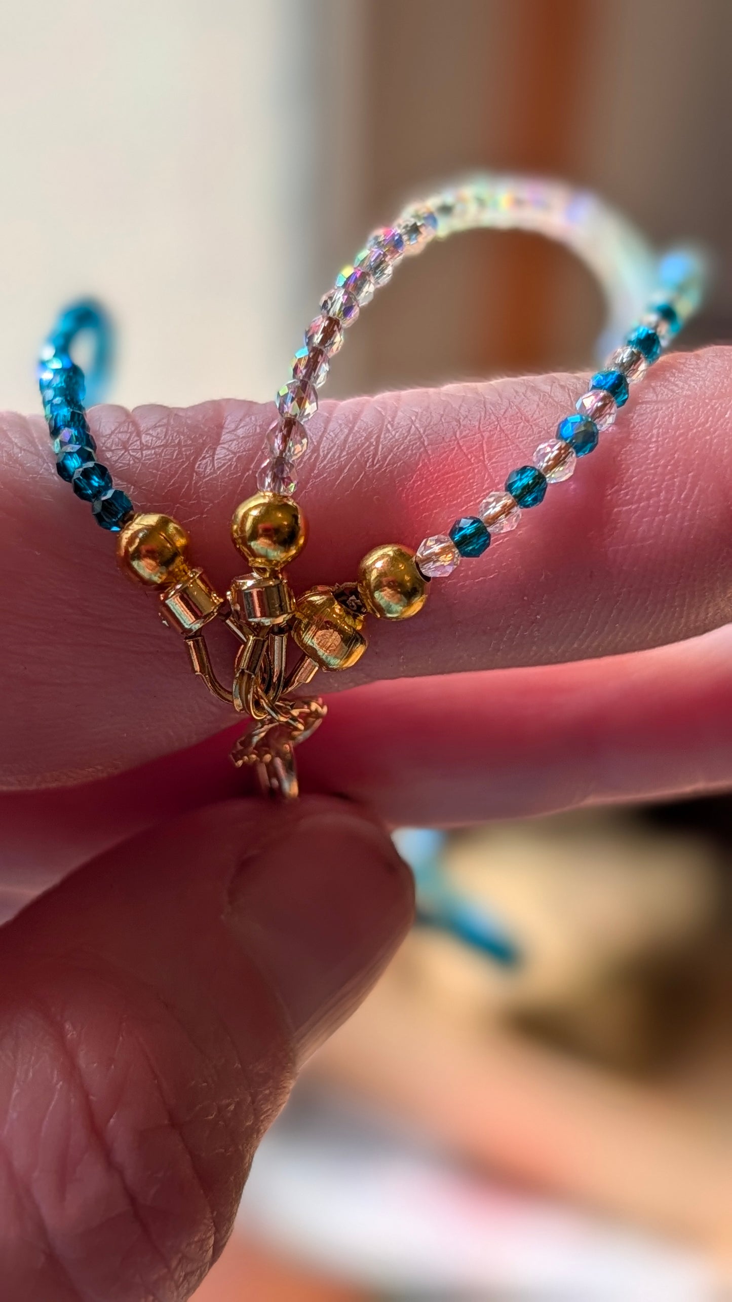 Aqua AB and clear AB crystal multi strand bracelet with gold filled closure