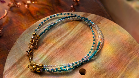 Aqua AB and clear AB crystal multi strand bracelet with gold filled closure