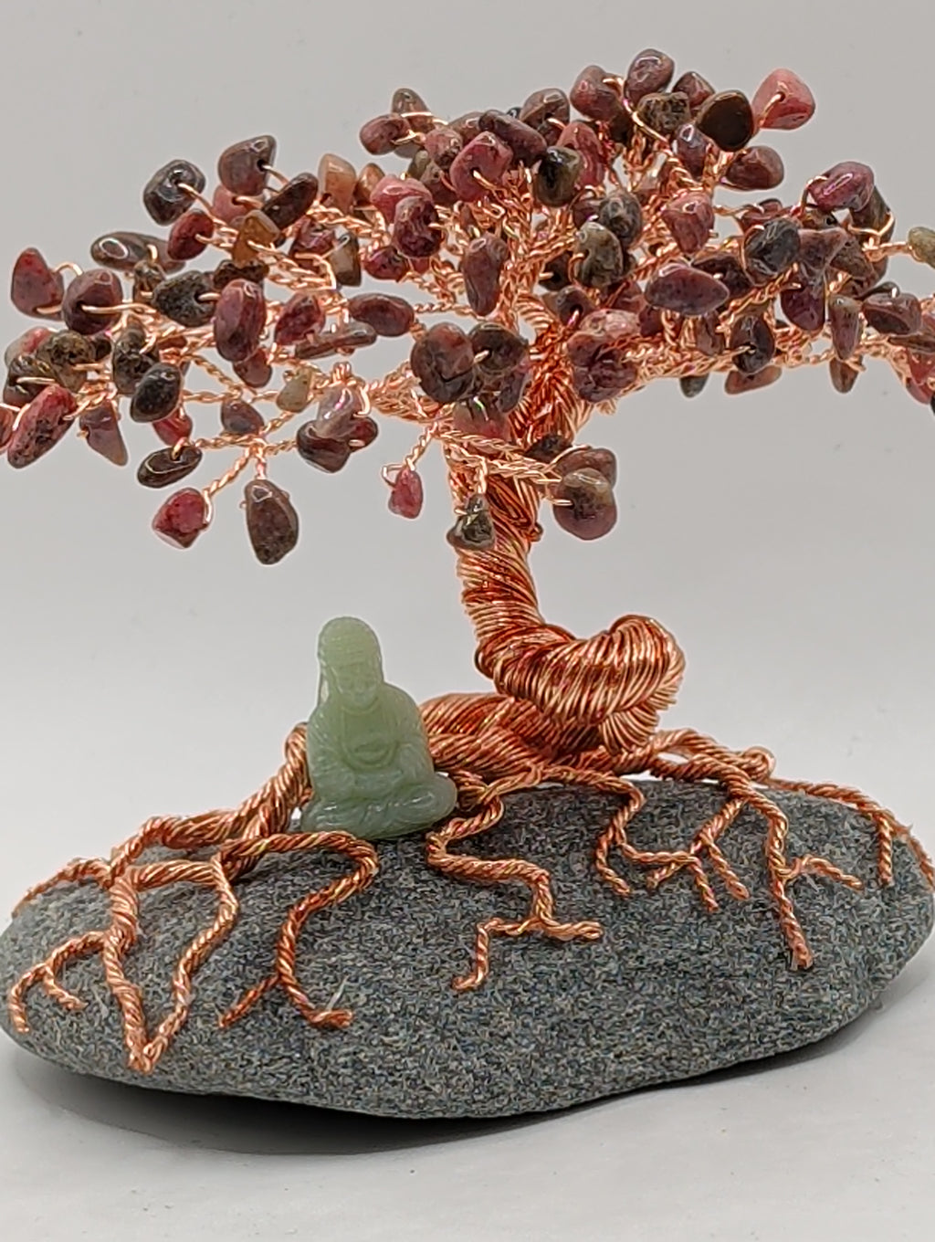 Bodhi tree of life with meditating Buddha