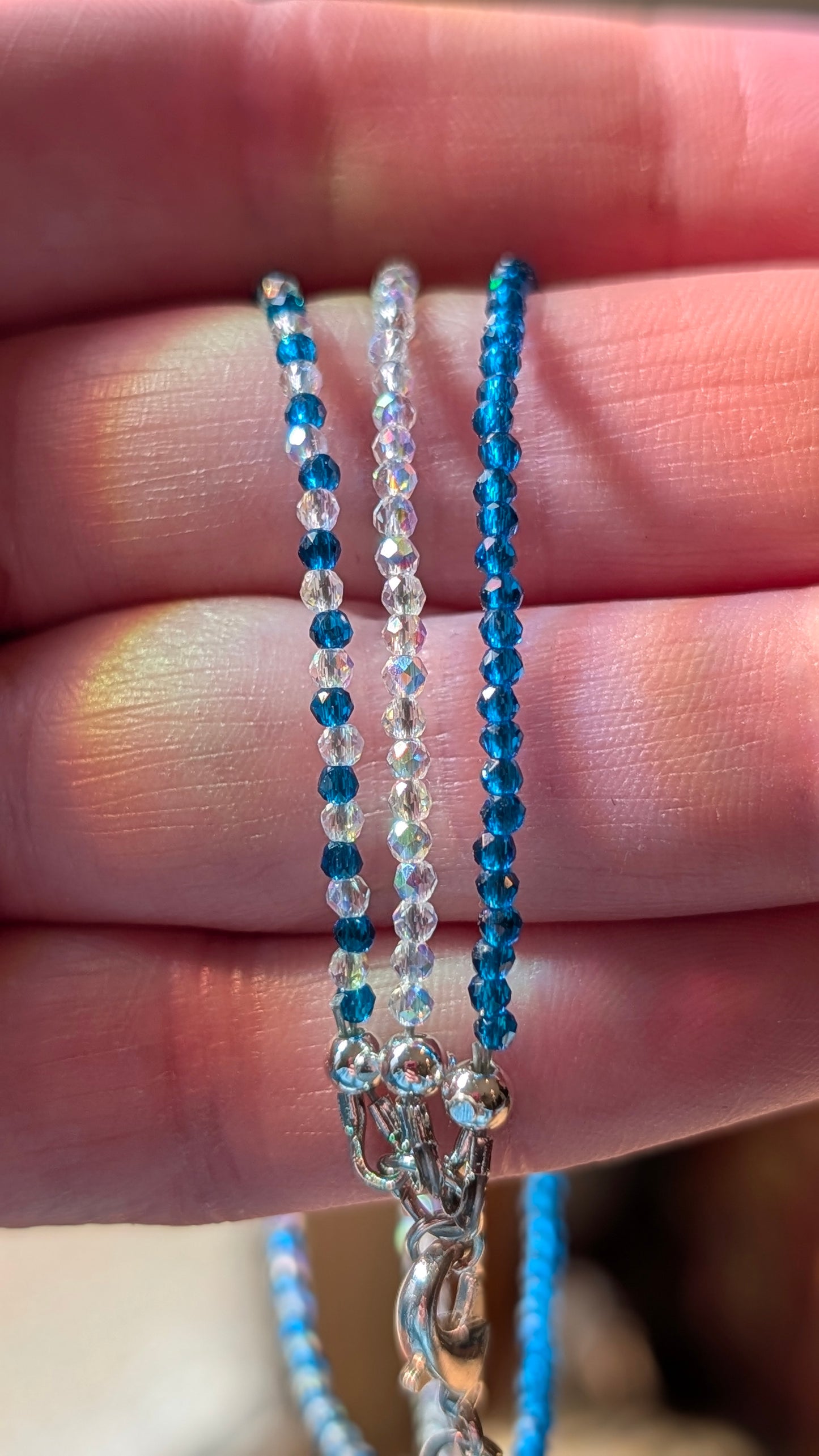 Aqua AB and clear AB crystal multi strand bracelet with gold filled closure